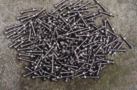[a heap of 220 nuts and bolts]